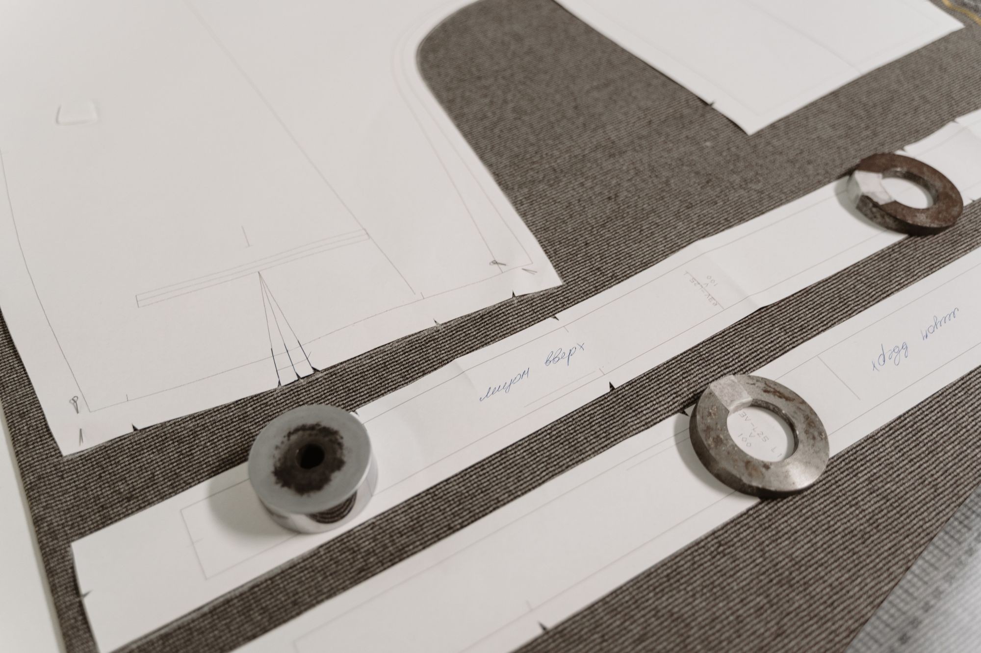 Garment patterns placed on fabric for cutting